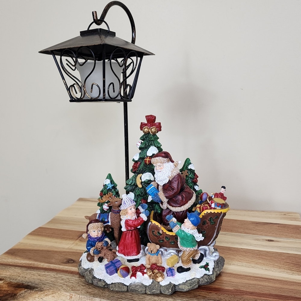 Christmas Candle Lamp Scene Santa on Sleigh Giving Gifts to Children